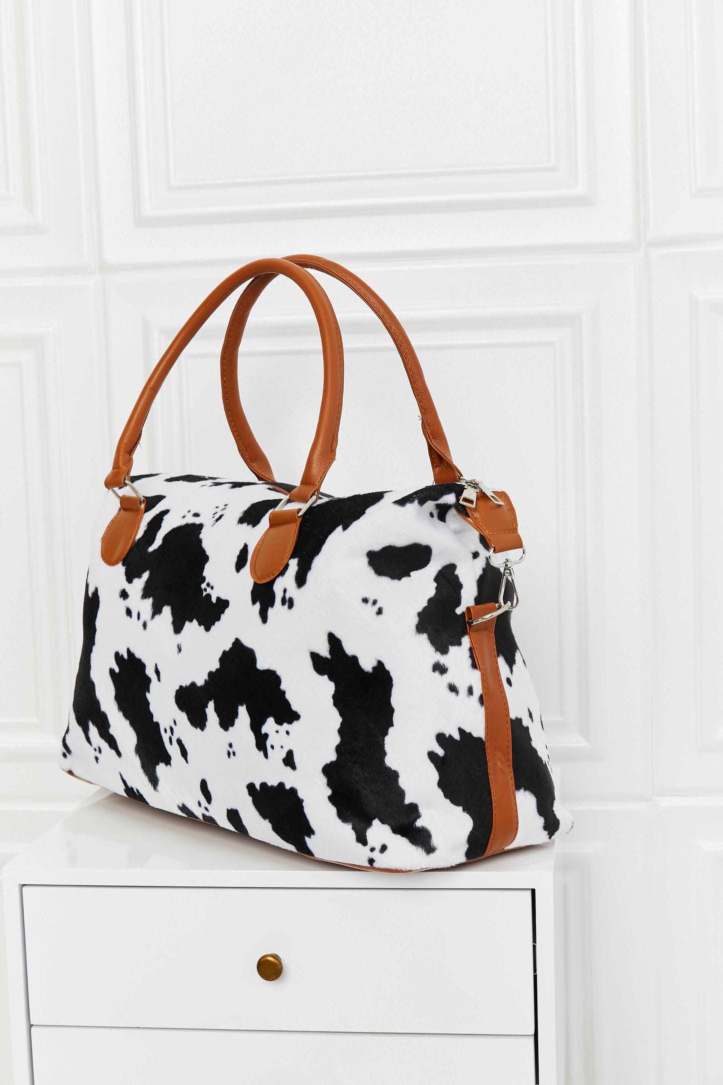 cow print weekender bag